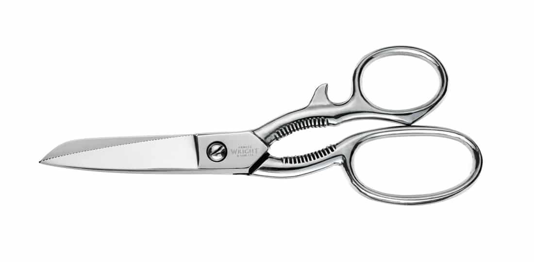Product photo from Ernest Wright: Hand-made scissors and shears, made in small batches at Kutrite Works on Broad Lane, with a lifetime warranty. Kitchen scissors from £105.